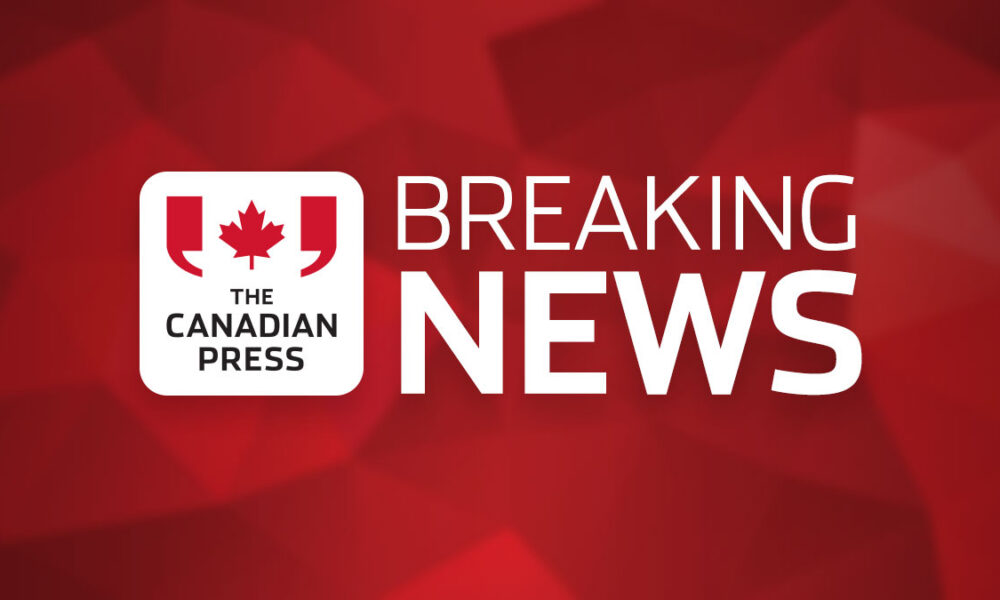 A graphic indicating 'Breaking News' from The Canadian Press, featuring their logo with a maple leaf and quotation marks on a red background.